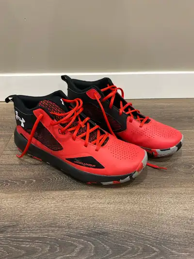 Men’s size 12 under armour cross trainers. Only worn a handful of times indoors. $25