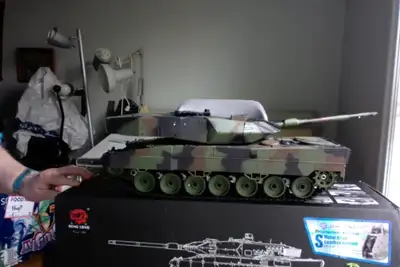 !/16 scale R/C leopard Tank. New in box, made by Hen Long. $200.00 .
