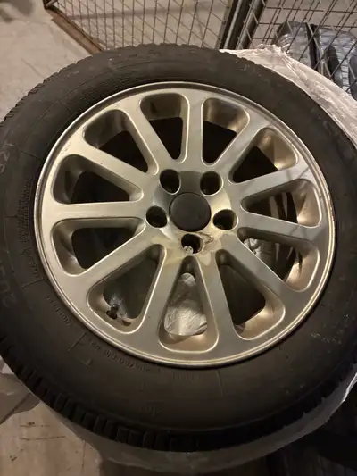 16 inch Lloyd rims on winter tires , Tires are a bit older, but in ok condition. Rims in excellent c...