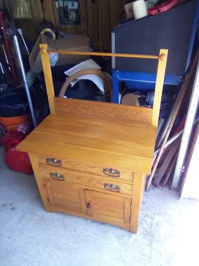 Antique washstand with 2 drawers and a cupboard. Beautifully engraved