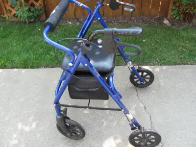 Hugo Walker Soft seat, 21 inch height, soft basket folding wheels, locking brakes.