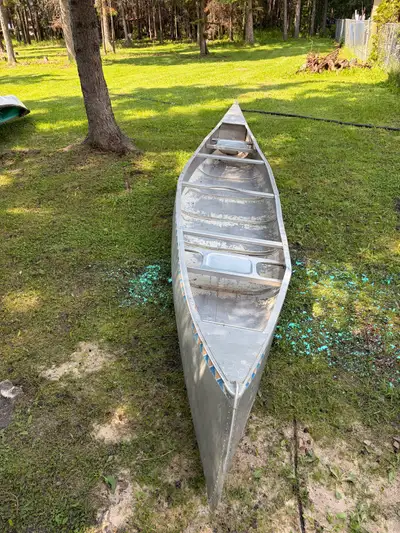 Canoe for sale. 17 foot aluminum. Located at Candle Lake. $450