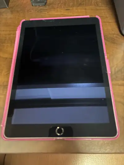 Up for sale is an Apple iPad Air 2, in great condition. Comes with charging cable and protective cas...