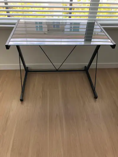 Modern office desk with tempered glass top. ✅ Excellent condition ✅ Sturdy frame ✅ Clean and well ma...