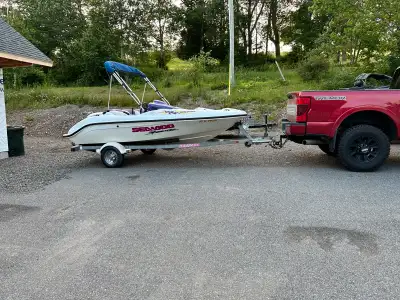 Cruising into summer with this 1997 Seadoo Speedster, a fun jet boat perfect for zipping across the...