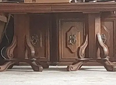 Large solid wood dining table with 2 inserts. Easily seats 10-12 people. Top of the table needs some...