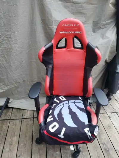 used gaming chair with raptors blanket , View more