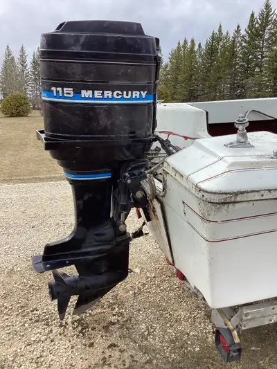 115hp Mercury motor, 6 cyl. longshaft. Comes with power trim, shifter control box, cables and boat w...