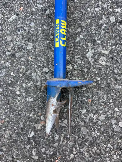 Lawn Claw weed removal extractor garden tool.