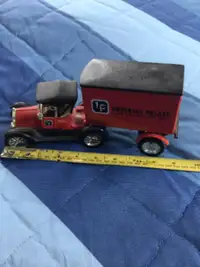 Model t Ford toy truck and trailer