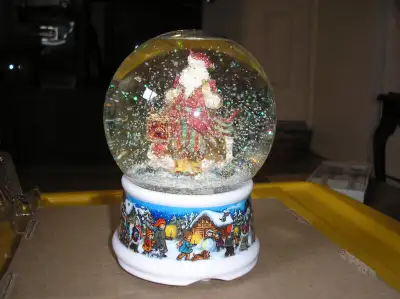 Santa musical snow globe, View more