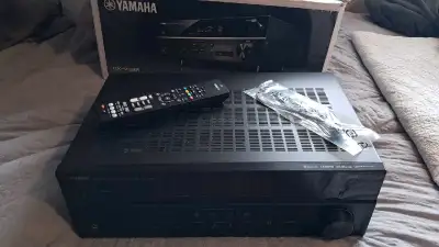 Receiver Yamaha, brand new, 4 speaker, right, left, top and back, everything works, just used for my...