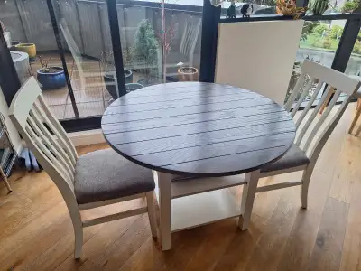 Small round kitchen table and two chairs, View more