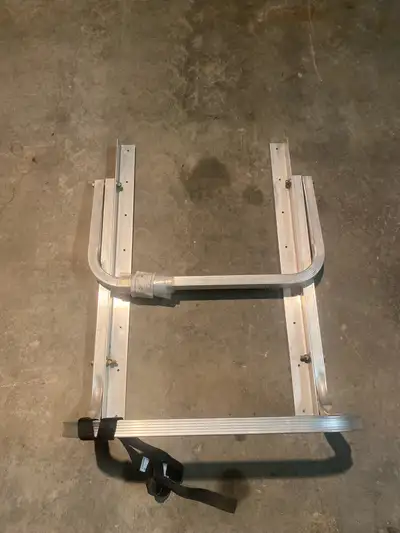 New TRITON hoop spare tire carrier for trailer.