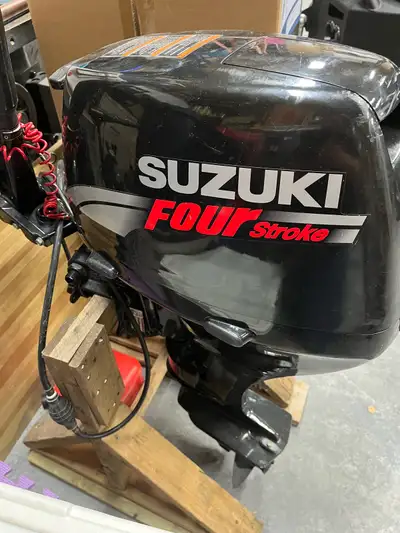 Suzuki 4stroke 15hp short shaft outboard. LOW HOURS always used synthetic oils. Always stored inside...