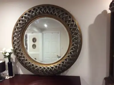 Large framed beveled mirror. For. $200 reduced to $135 reduced to $125, reduced to $75 Round. Frame,...