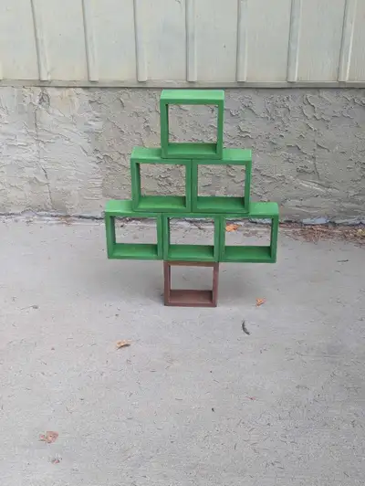 Handmade. Painted. Ready to use. Measures: 32"H by 24"W (bottom) Price is firm. Can deliver for a fe...