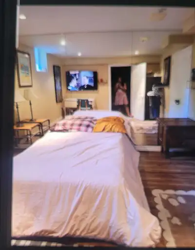 A must see 10 foot celing basement room for rent. Fully furnished room for rent.. All utililities ib...