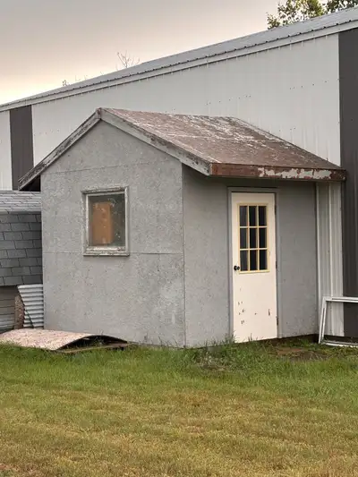 Used storage shed with dimensions of approximately 11’ x 8’4”, providing ample space for your outdoo...