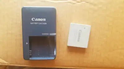 Chargeur de battery canon camera NB-4L, .74 v A montreal. Ville mont royal sir rdv vous venez le che...