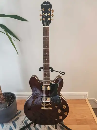 Korean made Epiphone dot stock as far as I know but has had the tuners replaced due to the extra hol...