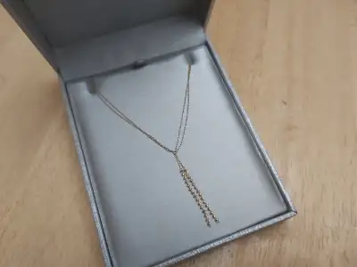 Yellow gold necklace 18K.. 2 grams . Double delicate chain 16 inches ..Pick up only. .. $350...Cash...