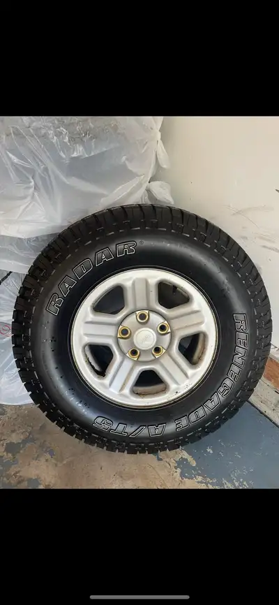 5 jeep tires. Decent shape 1 brand new spare. Jeep JK 5x5" spacing 5x127mm