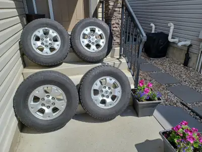 Set of 4 Toyota rims and Nokia tires size 245/75/R16 with 50% tread, which recently came off a 2012...