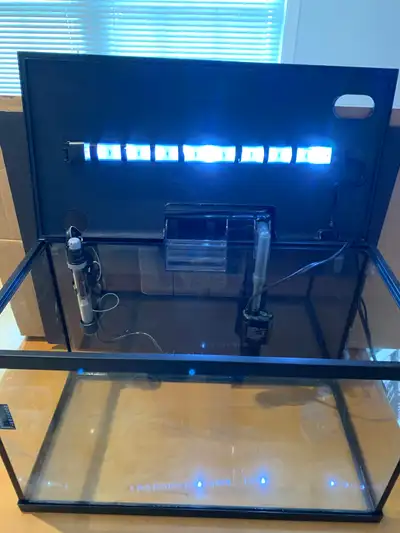 20L aquarium ( 20 width, 12 height, 10 depth). Comes with filter, water heater, light and many acces...