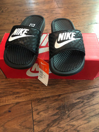 Brand new Slides. Nike.  Size 7