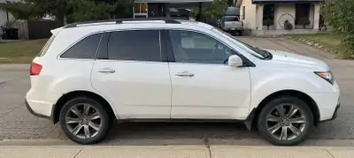 Fully loaded 2011 mdx elite package SH-AWD, white exterior, Black interior. Dual zone air conditioni...
