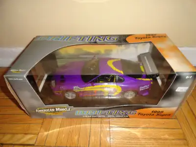 1:18 1995 TOYOTA SUPRA BY AMERICAN MUSCLE RACING CHAMPION RC2