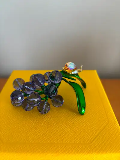 Swarovski Crystal Snail and Blueberries - NEW This crystal piece has a tiny crystal snail exploring...