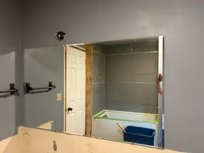 Vanity mirror 5ft x 3 ft. Pickup just outside Lindsay. Slight damage in bottom outside corners. Free
