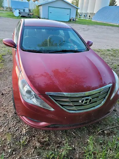 BRAND NEW 2.4L ENGINE, installed by the dealership. Original km 300k. Brand new battery. Cloth heate...
