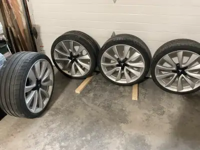 Selling 4 Tesla rims with tires One rim has a crack apparently so the tire won’t seal possibly repai...
