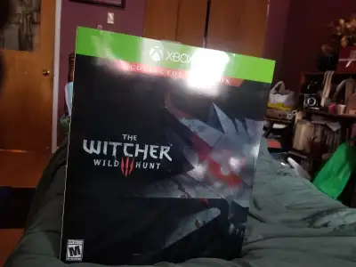 This rare sealed and never opened collector's edition includes a hand painted statue of Geralt fight...