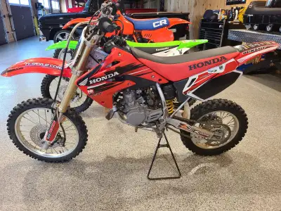 CASH ONLY - NO TRADES!! 2005 Honda CR85R Super solid little bike but way too fast on the trails for...