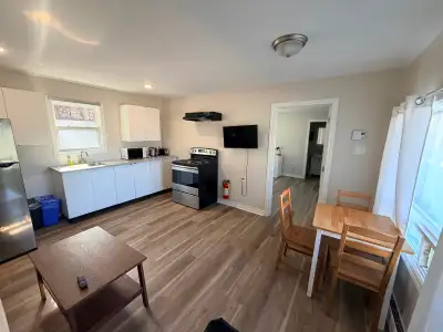 One bedroom apartment at Homeport Motel for 1 year term rent. Full kitchen with fridge, stove, micro...