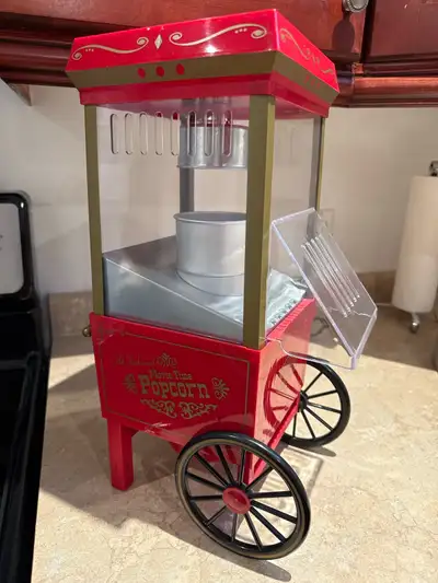Get ready for movie night with this Nostalgia Old-Fashioned Movie Time popcorn machine! This unit po...