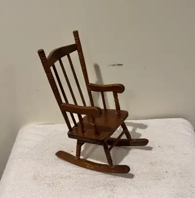  Cute miniature wooden rocking chair. , View more