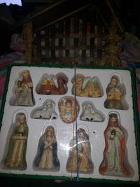 11 piece hand painted Christmas collectibles with wooden barn