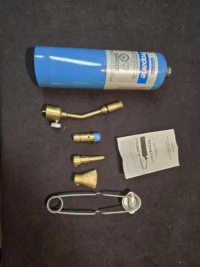 Torch, partially full cylinder, starter, heads, instructions and carrying box with handle. Located i...