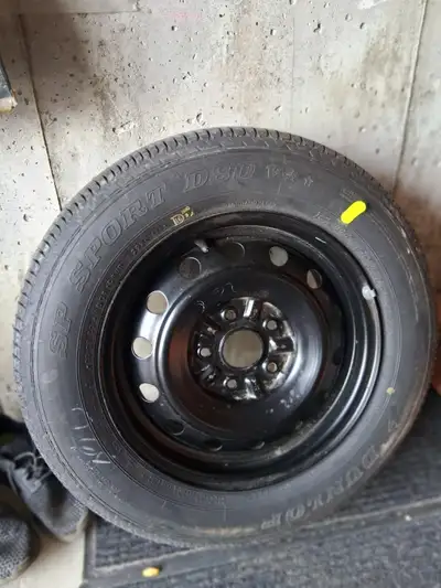 This was my spare tire, in a Toyota Camry. Both tire and rim have never been used.