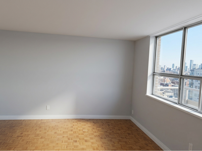 Bright and spacious living room available for rent in a 2-bedroom apartment. The space is unfurnishe...