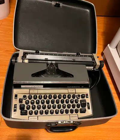 Electric typewriter with case- vintage style, View more