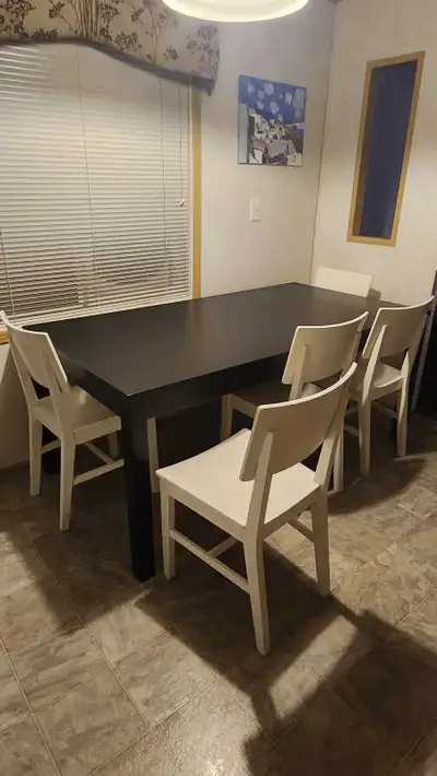 Ikea dining table with 6 chairs. Seats 12 with leafs in. Some scratches. Cash only. No holds. No del...