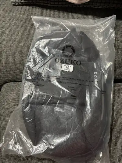 Unopened and unused anti theft shoulder sling bag perfect for travelling to busy areas.