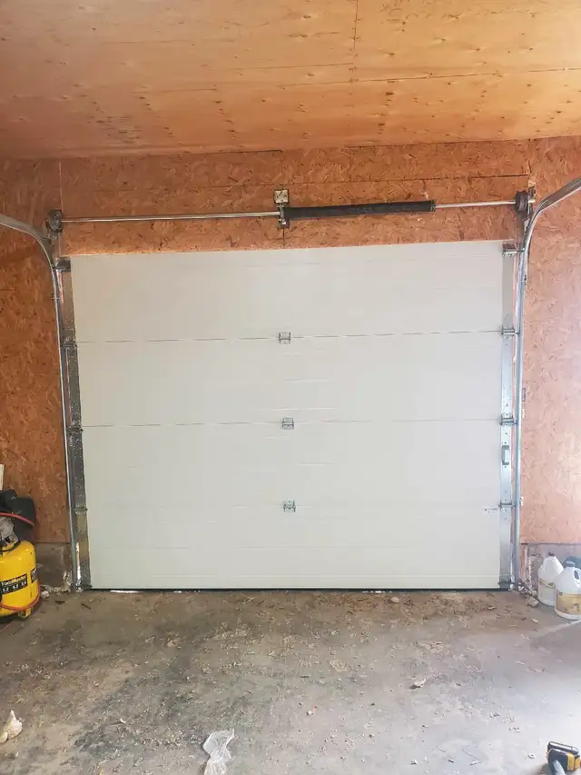 GARAGE DOOR REPAIRS   306 716 105363007357648001124