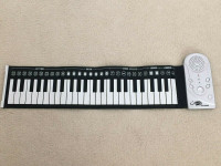 Rollin Piano Keyboard 49 Keys 30 Functions Soft Mat Rolls up Tou